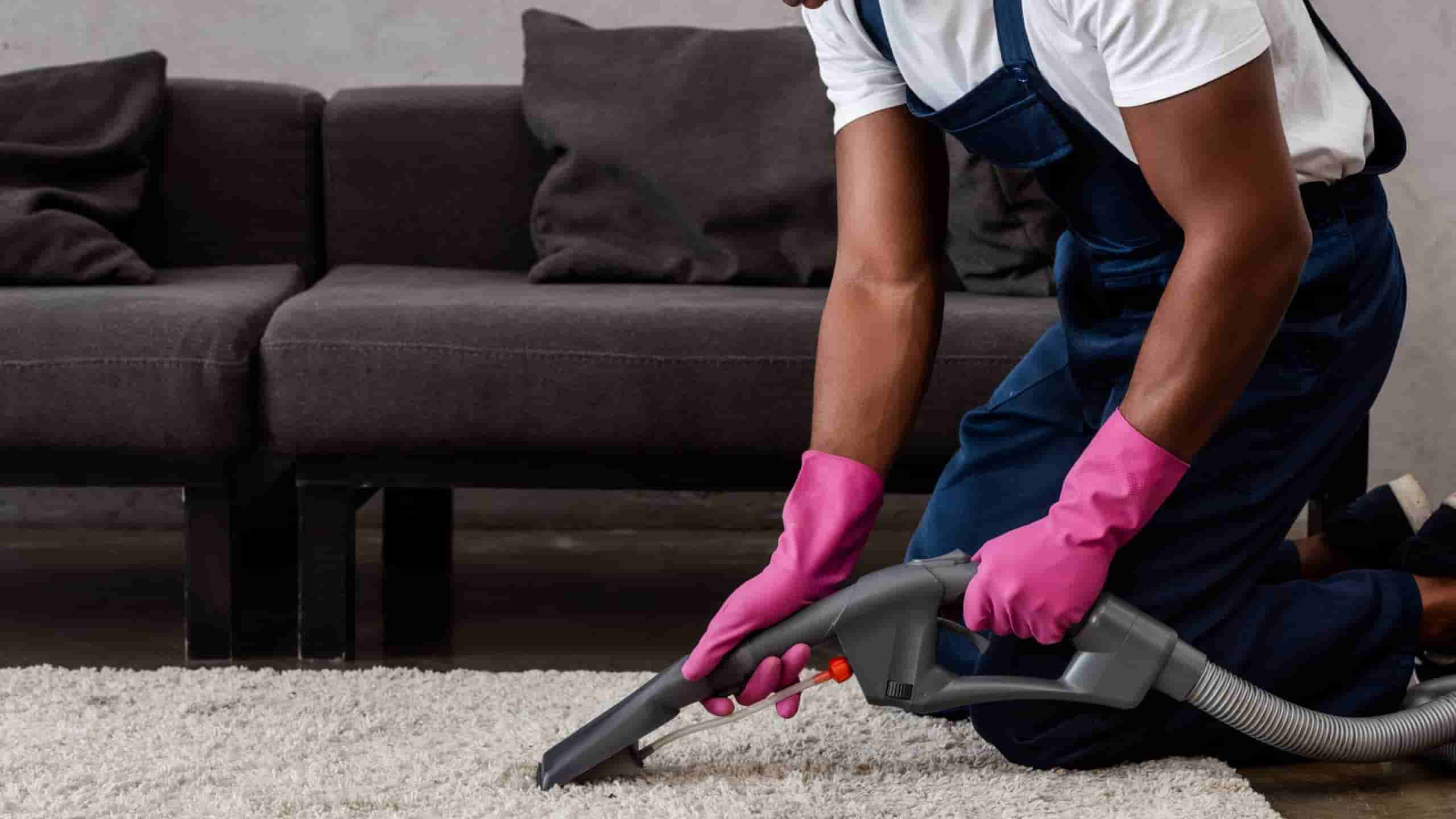 What is the difference between steam cleaning and dry cleaning for carpets?